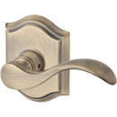 Baldwin Reserve HDCURLTAR049 Half Dummy Left Hand Curve Lever and Traditional Arch Rose Matte Brass and Black Finish - Left Hand - Brass